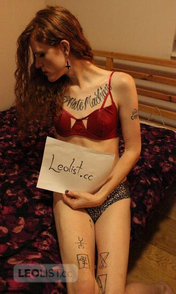 luxurious tattooed pierced tall hung redhead tgirl escort